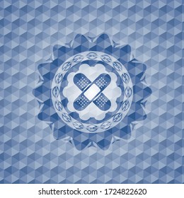 crossed bandage plaster icon inside blue emblem with geometric pattern. 