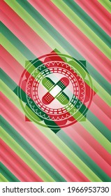 crossed bandage plaster icon inside christmas badge. 