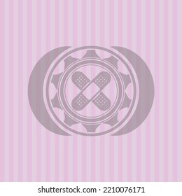 crossed bandage plaster icon inside pink emblem. Retro. Detailed design. 
