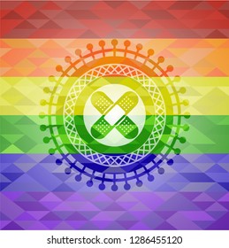 crossed bandage plaster icon on mosaic background with the colors of the LGBT flag