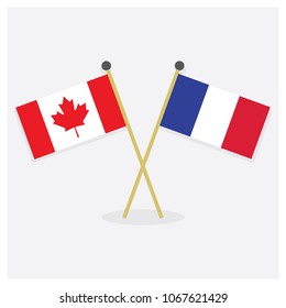 Crossed Canada and France flags icons with shadow on off white background