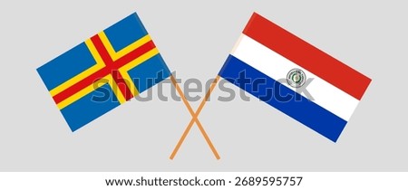 Crossed flags of Aland Islands and Republic of Paraguay. Official colors. Correct proportion. Vector illustration.
