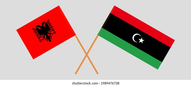 Crossed flags of Albania and Libya. Official colors. Correct proportion