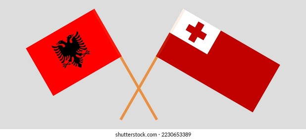 Crossed flags of Albania and Tonga. Official colors. Correct proportion. Vector illustration
