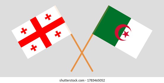 Crossed flags of Algeria and Georgia