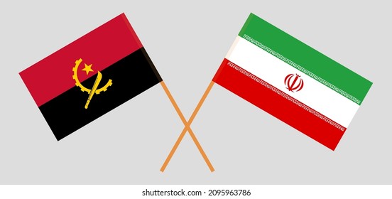 Crossed flags of Angola and Iran. Official colors. Correct proportion. Vector illustration

