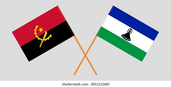 Crossed flags of Angola and Kingdom of Lesotho. Official colors. Correct proportion