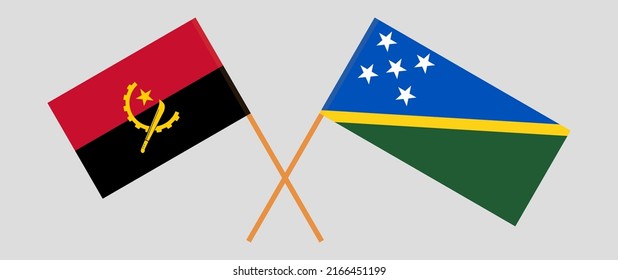 Crossed flags of Angola and Solomon Islands. Official colors. Correct proportion. Vector illustration
