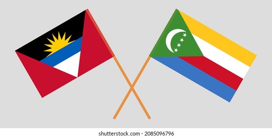 Gekreuzte Flaggen von Antigua und Barbuda und den Komoren. Offizielle Farben. Richtiger Anteil. Vektorgrafik
