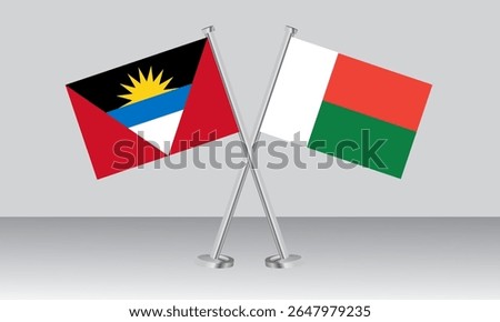 Crossed flags of Antigua and Barbuda and Madagascar. Official colors. Correct proportion. Banner design