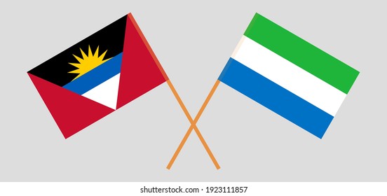 Crossed flags of Antigua and Barbuda and Sierra Leone. Official colors. Correct proportion