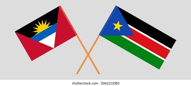 Crossed flags of Antigua and Barbuda and South Sudan. Official colors. Correct proportion