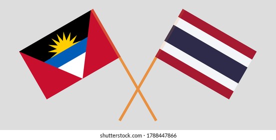 Crossed flags of Antigua and Barbuda and Thailand