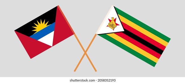 Crossed flags of Antigua and Barbuda and Zimbabwe. Official colors. Correct proportion