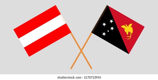 Crossed flags of Austria and Papua New Guinea. Official colors. Correct proportion. Vector illustration
