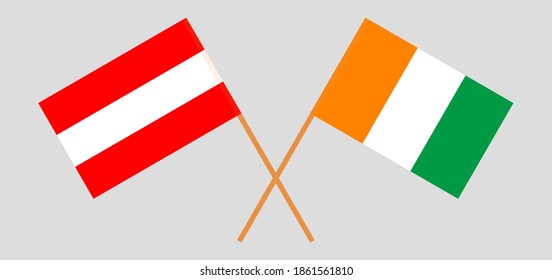 Gekreuzte Flaggen Österreichs und der Republik Côte d'Ivoire
