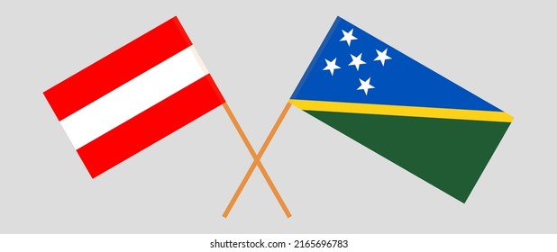 Crossed flags of Austria and Solomon Islands. Official colors. Correct proportion. Vector illustration
