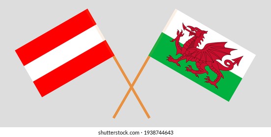 Crossed flags of Austria and Wales. Official colors. Correct proportion