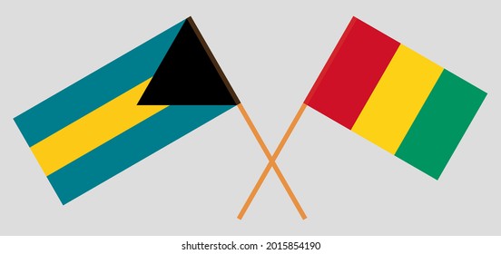 Crossed flags of the Bahamas and Guinea. Official colors. Correct proportion