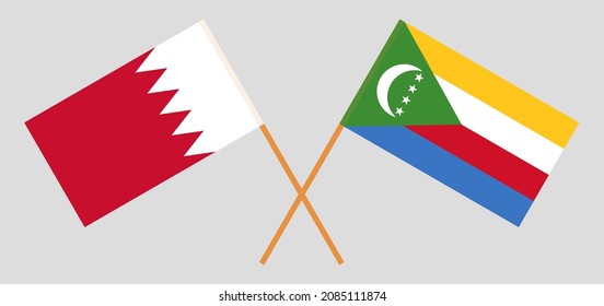 Crossed flags of Bahrain and the Comoros. Official colors. Correct proportion. Vector illustration
