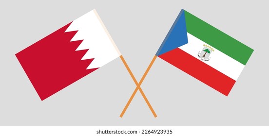 Gekreuzte Flaggen von Bahrain und Äquatorialguinea. Offizielle Farben. Richtiger Anteil. Vektorgrafik
