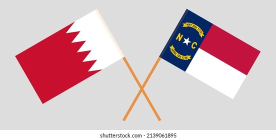 Crossed flags of Bahrain and The State of North Carolina. Official colors. Correct proportion. Vector illustration
