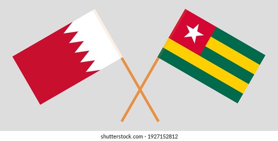 Crossed flags of Bahrain and Togo. Official colors. Correct proportion