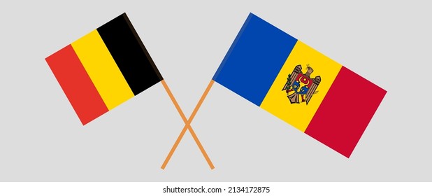 Crossed flags of Belgium and Moldova. Official colors. Correct proportion. Vector illustration
