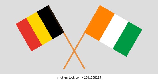 Crossed flags of Belgium and Republic of Ivory Coast