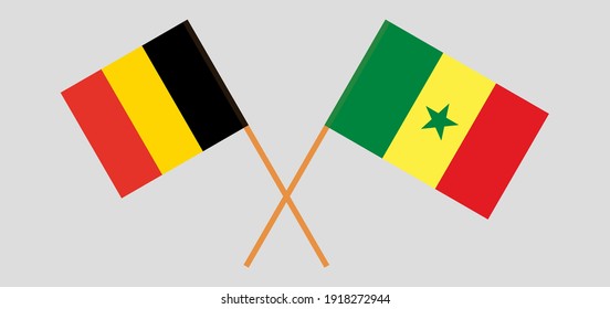 Crossed flags of Belgium and Senegal
