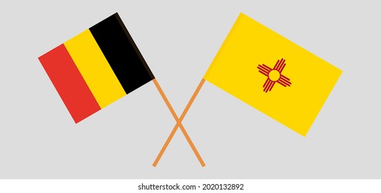 Crossed flags of Belgium and the State of New Mexico. Official colors. Correct proportion. Vector illustration