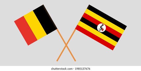 Crossed flags of Belgium and Uganda. Official colors. Correct proportion