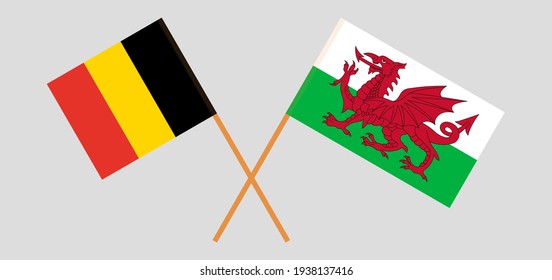Crossed flags of Belgium and Wales. Official colors. Correct proportion