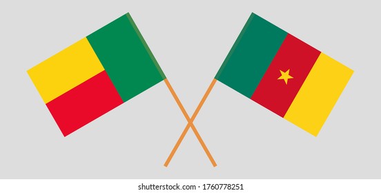 Crossed flags of Benin and Cameroon. Official colors. Correct proportion. Vector illustration
