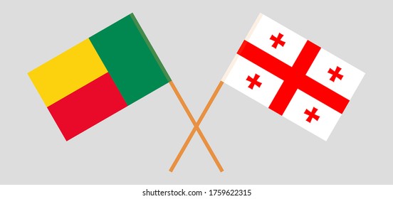 Crossed flags of Benin and Georgia. Official colors. Correct proportion. Vector illustration
