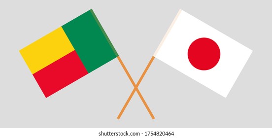 Crossed flags of Benin and Japan. Official colors. Correct proportion. Vector illustration