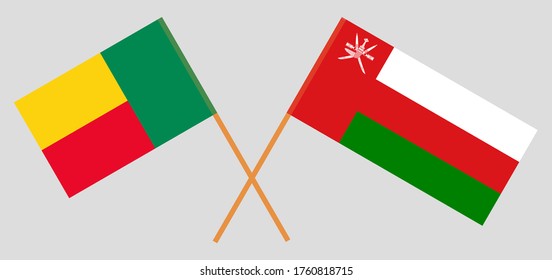 Crossed flags of Benin and Oman. Official colors. Correct proportion. Vector illustration
