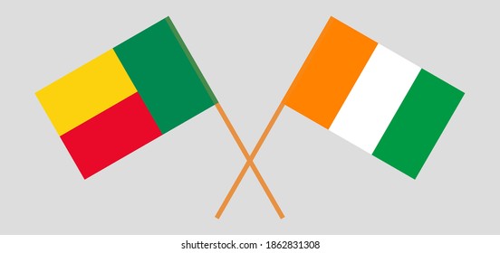 Crossed flags of Benin and Republic of Ivory Coast