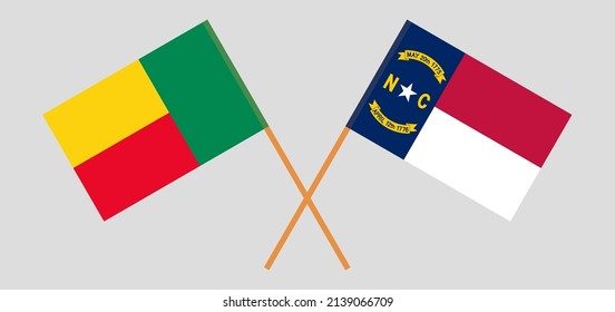 Crossed flags of Benin and The State of North Carolina. Official colors. Correct proportion. Vector illustration
