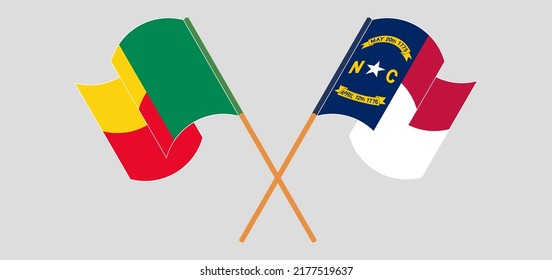 Crossed flags of Benin and The State of North Carolina. Official colors. Correct proportion. Vector illustration
