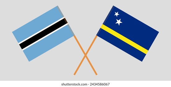 Crossed flags of Botswana and Country of Curacao. Official colors. Correct proportion. Vector illustration
