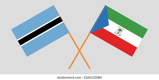 Crossed flags of Botswana and Equatorial Guinea. Official colors. Correct proportion. Vector illustration
