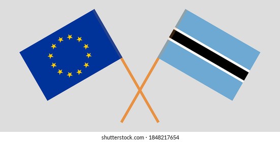 Crossed flags of Botswana and the EU
