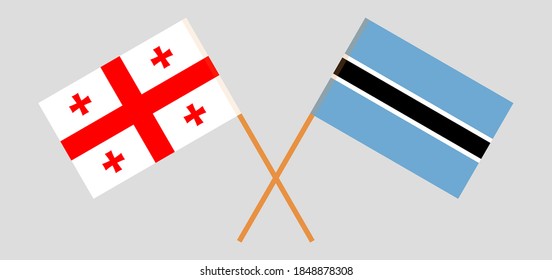Crossed flags of Botswana and Georgia