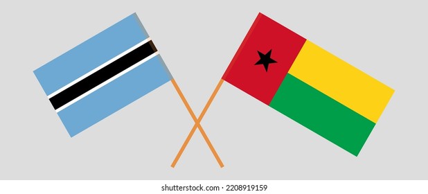 Crossed flags of Botswana and Guinea-Bissau. Official colors. Correct proportion. Vector illustration
