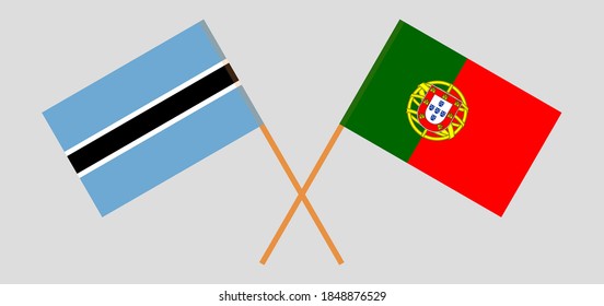 Crossed flags of Botswana and Portugal
