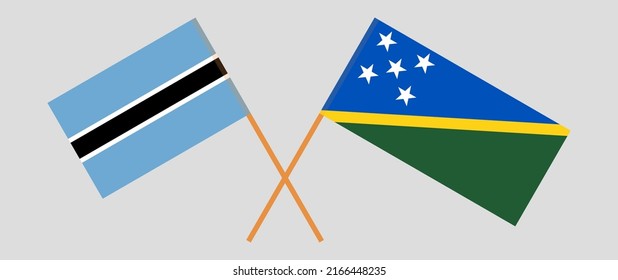Banderas cruzadas de Botswana y las Islas Salomón. Colores oficiales. Proporción correcta. Ilustración del vector

