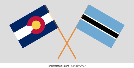 Crossed flags of Botswana and The State of Colorado