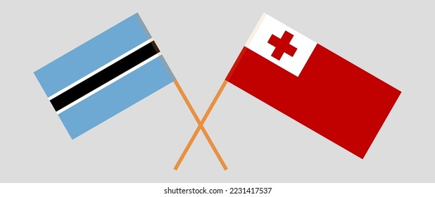 Crossed flags of Botswana and Tonga. Official colors. Correct proportion. Vector illustration
