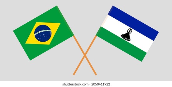 Crossed flags of Brazil and the Kingdom of Lesotho. Official colors. Correct proportion